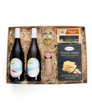 A gift box with two bottles of California wine - Pinot Noir and Chardonnay, two types of cheese, crackers, stone-ground mustard, and a summer sausage.